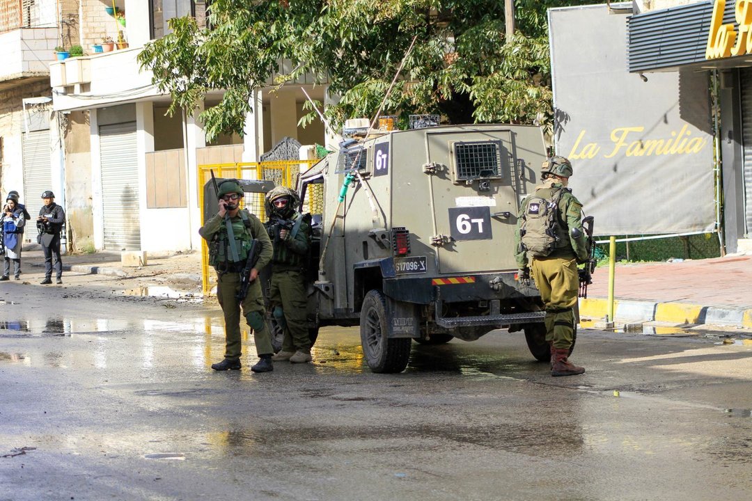 December 13, 2023, Jenin, Palestine: Israeli soldiers take their positions at the entrances to the Jenin refugee camp in the West Bank during the military operation. During a military operation inside Jenin camp searching for militants. Violence has escalated in the Palestinian territories since the war against Hamas in the Gaza Strip.,Image: 829294348, License: Rights-managed, Restrictions: , Model Release: no, Credit line: Nasser Ishtayeh / Zuma Press / ContactoPhoto