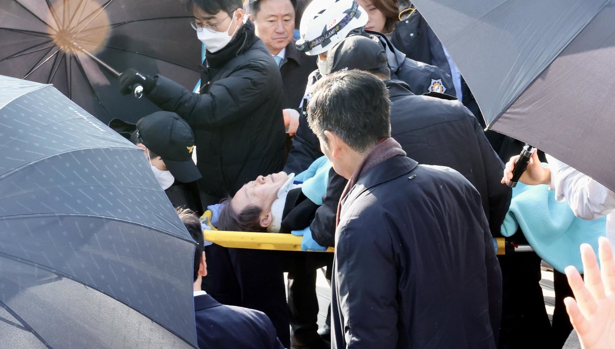 BUSAN, Jan. 2, 2024  -- Lee Jae-myung, chief of South Korea's main opposition Democratic Party, is rushed to a hospital after being attacked during his visit to Busan, South Korea, Jan. 2, 2024. Lee was taken to a hospital after being attacked by an unidentified person, multiple local media reported Tuesday.
    During his visit to the country's southeastern port city of Busan, Lee was stabbed in his left neck by an unidentified man.
    The suspect carrying an unidentified weapon on his hand was arrested at the scene.,Image: 833648541, License: Rights-managed, Restrictions: , Model Release: no, Credit line: Yao Qilin / Xinhua News / ContactoPhoto