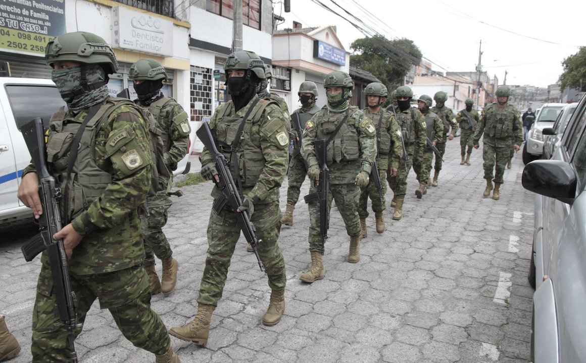BEIJING, Jan. 11, 2024  -- Ecuadorian troops patrol in Quito, Ecuador, Jan. 9, 2024. Ecuadorian President Daniel Noboa on Tuesday declared "internal armed conflict" and mobilized the army to combat organized crime linked to drug trafficking, following an escalation in violence in the South American country.
   Ecuador's government declared a 60-day state of emergency on Monday with a nighttime curfew to quell violence in cities and inside prisons.
   Tuesday's measure followed a day of riots and disturbances at several prisons, including a prisonbreak that saw 39 inmates escape from a facility in the Andean city of Riobamba and the shocking armed takeover of a television station in Guayaquil in mid-broadcast.,Image: 835636601, License: Rights-managed, Restrictions: , Model Release: no, Credit line: Mateo Armas / Xinhua News / ContactoPhoto