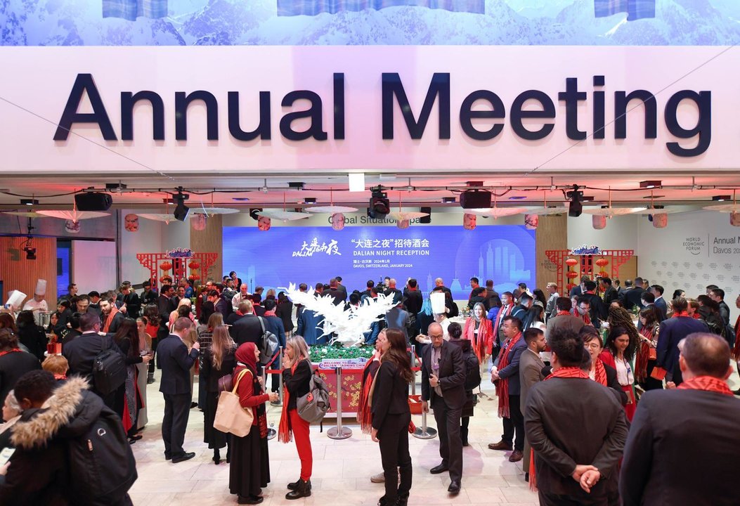 DAVOS, Jan. 17, 2024  -- People attend a reception held by China's Dalian City during the World Economic Forum (WEF) Annual Meeting 2024 in Davos, Switzerland, Jan. 16, 2024. Dalian, the host city of the Annual Meeting of the New Champions 2024, held a reception on Tuesday evening in Davos. The event featured a cultural performance and local gourmet cuisine to celebrate the Chinese Lunar New Year in snowy Davos.,Image: 837950013, License: Rights-managed, Restrictions: , Model Release: no, Credit line: Lian Yi / Xinhua News / ContactoPhoto