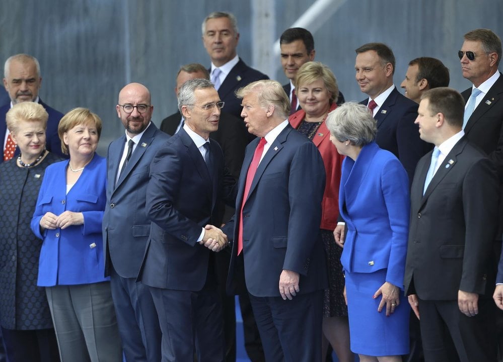 July 11, 2018 - Brussels, Belgium - NATO Secretary General JENS STOLTENBERG (center L) shakes hands with U.S. President DONALD TRUMP during a NATO summit in Brussels. NATO leaders gather in Brussels for a two-day meeting.,Image: 377538692, License: Rights-managed, Restrictions: * Italy Rights OUT *, Model Release: no, Credit line: Mondadori Portfolio / Zuma Press / ContactoPhoto