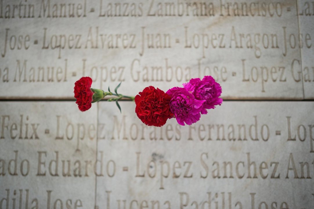 October 31, 2022, Malaga, Spain: Carnations are seen placed on the facade of a mausoleum at the cemetery of San Rafael, ahead of All Saint's Day. The Association for the Recovery of Historical Memory (ARMH) from Malaga organize every year a tribute in memory of their republican relatives who were killed during the civil war by forces of Spanish dictator Francisco Franco.,Image: 734499657, License: Rights-managed, Restrictions: , Model Release: no, Credit line: Jesus Merida / Zuma Press / ContactoPhoto