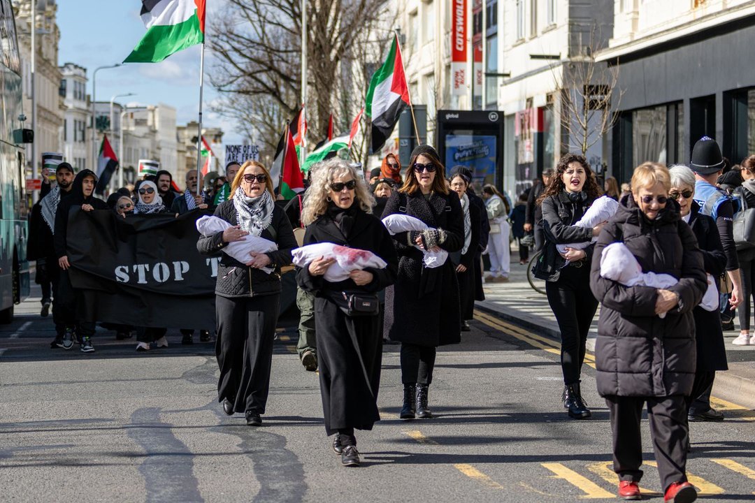 March 3, 2024: Brighton, UK. 03 March 2024. A pro-Gaza rally take place in Brighton, UK. Demonstrators waved Palestinian flags and called for an immediate ceasefire and the stop of the "Israeli genocide" in Gaza. Some women held a white cloth to remember the babies and children killed in the Israeli offensive on the blockaded Palestinian enclave. According to the Hamas-run Gaza health authorities, more than 30,400 Palestinians, most of whom women and children, have been killed, and 71,700 wounded in Israeli strikes on Gaza since Oct 7th. The dire humanitarian situation is further exacerbated by the minimum amount of humanitarian aid trucks allowed to enter Gaza by Israel, with Gazans facing an imminent threat of starvation and widespread of disease,Image: 853316345, License: Rights-managed, Restrictions: , Model Release: no, Credit line: Matt Duckett / Zuma Press / ContactoPhoto