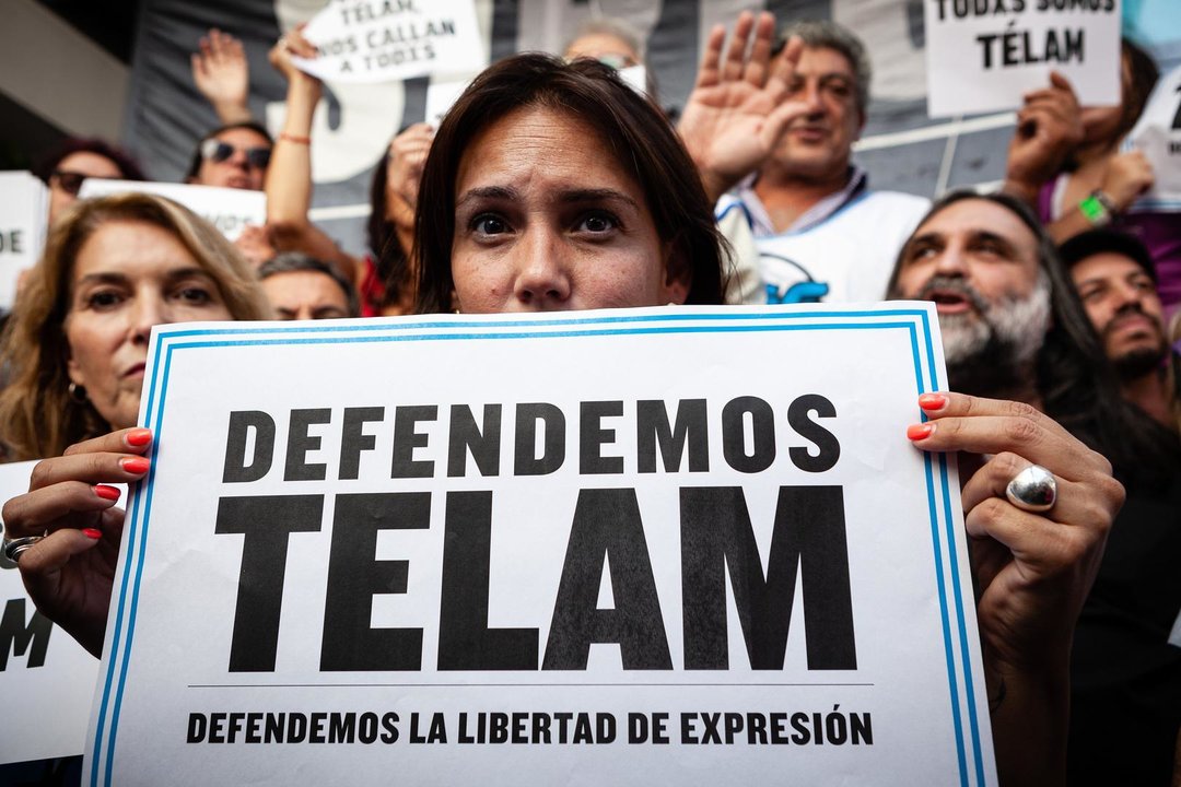 March 4, 2024, Buenos Aires, Argentina: Employees of the state news and advertising agency TELAM protest outside after the government of President Milei took the untimely and inexplicable policy of closing TELAM. Today the 755 journalists who work there found themselves with the door guarded by the police, unable to carry out their work. The website, which is a historical archive of more than 78 years of news, was deactivated. Telam functioned as a news wholesaler, disseminating 500 notes (cables) along with about 200 daily photos of the most diverse events. In addition, it was in charge of implementing, controlling and billing the distribution of the national government's official advertising.,Image: 853674158, License: Rights-managed, Restrictions: , Model Release: no, Credit line: Paula Acunzo / Zuma Press / ContactoPhoto