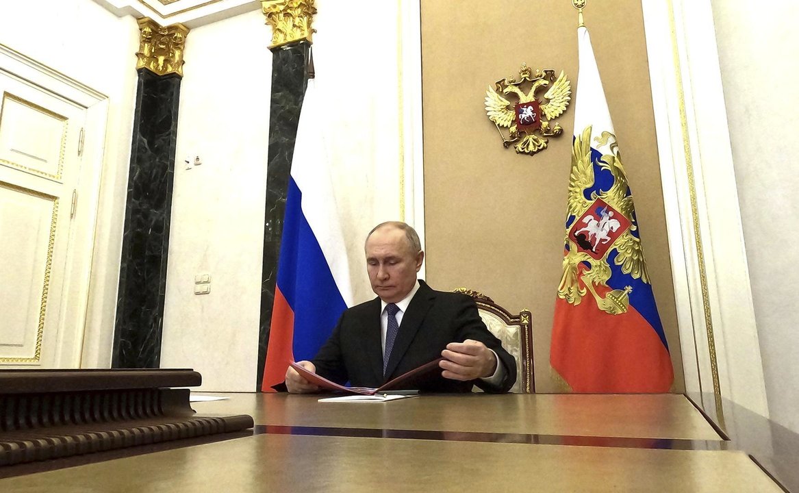 April 5, 2024, Moscow, Moscow Oblast, Russia: Russian President Vladimir Putin looks at documents as he chairs a video conference meeting with the permanent members of the Security Council from the Kremlin, April 5, 2024 in Moscow, Russia.,Image: 862733807, License: Rights-managed, Restrictions: , Model Release: no, Credit line: Mikhail Metzel/Kremlin Pool / Zuma Press / ContactoPhoto