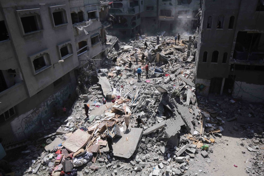 June 18, 2024, Al-Bureij, Gaza Strip, Palestinian Territory: Palestinians search the rubble of the Harb family home which was hit in overnight Israeli strikes in al-Bureij refugee camp in the central Gaza Strip amid the ongoing  Israel war on Gaza.,Image: 882657992, License: Rights-managed, Restrictions: , Model Release: no, Credit line: Omar Ashtawy / Zuma Press / ContactoPhoto