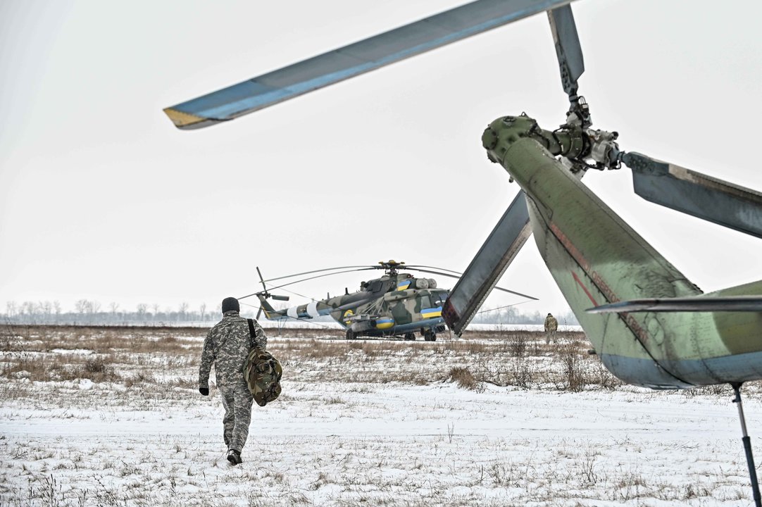 January 24, 2024, Zaporizhzhia, Ukraine: UKRAINE - JANUARY 24, 2024 - A serviceman of the 11th separate army aviation brigade ''Kherson'' of the Armed Forces of Ukraine approaches a helicopter, Ukraine.,Image: 841515062, License: Rights-managed, Restrictions: , Model Release: no, Credit line: Dmytro Smolienko / Zuma Press / ContactoPhoto