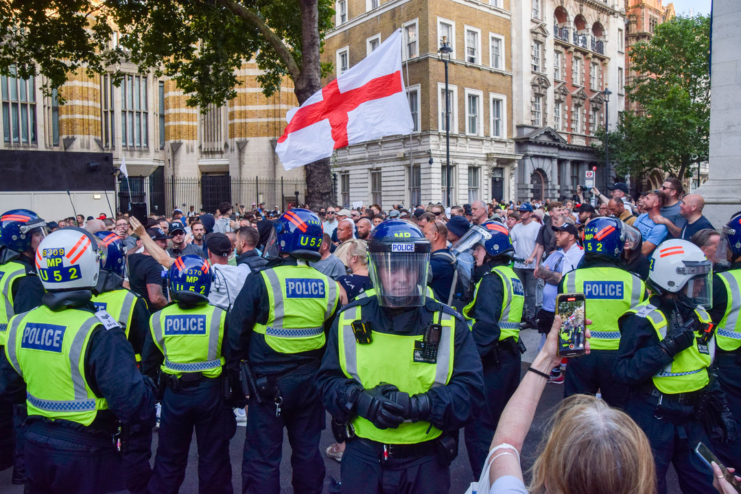 Police in riot gear face off with protesters in Whitehall. Crowds clashed with police officers and threw projectiles in Westminster as protesters turned violent after three young girls were killed in a knife attack in Southport.
Vuk Valcic / Zuma Press / ContactoPhoto